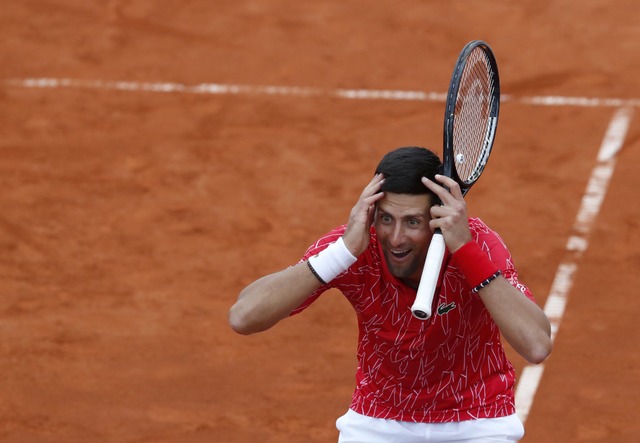 Novak Djokovic ist positiv auf das Coronavirus getestet worden.  | Foto: Darko Vojinovic (dpa)