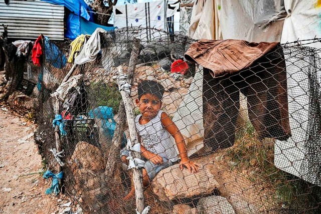 Ein Flchtlingskind im Lager von Moria   | Foto: ARIS MESSINIS (AFP)