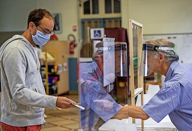 Infektionsschutz im Wahllokal  | Foto: Aurelien Morissard (dpa)