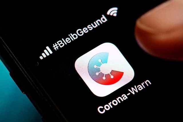 Die deutsche Corona-Warn-App ist mit d...eich und der Schweiz nicht kompatibel.  | Foto: Sven Hoppe (dpa)