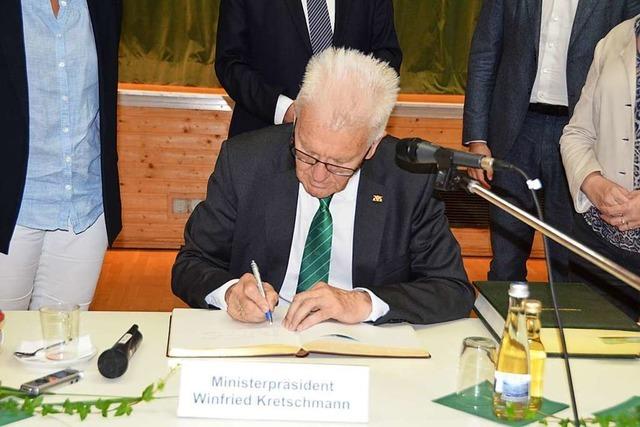 Ministerprsident Winfried Kretschmann besucht Husern