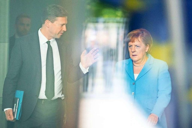 Bundeskanzlerin Angela Merkel  und  Re...ffre bisher nicht offiziell geuert.  | Foto: Kay Nietfeld (dpa)