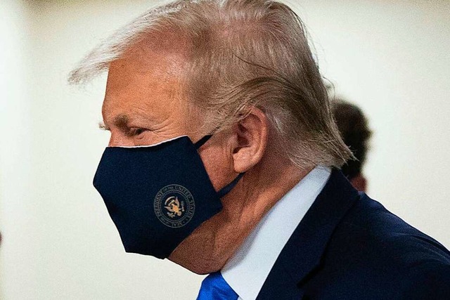 Trump trgt jetzt Maske.  | Foto: Chris Kleponis via www.imago-images.de