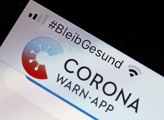 Auch auf Apple-Smartphones macht die Corona-Warn-App Probleme.  | Foto: Oliver Berg (dpa)