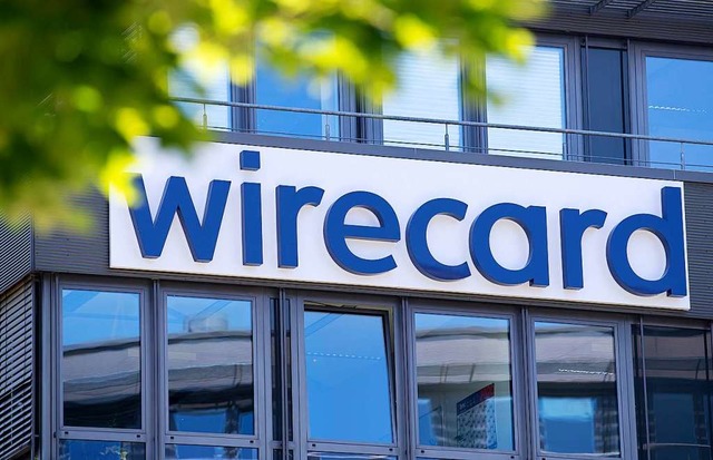 Die Wirecard-Aktie, die vor einem halb... kostete, ist heute praktisch wertlos.  | Foto: Sven Hoppe (dpa)