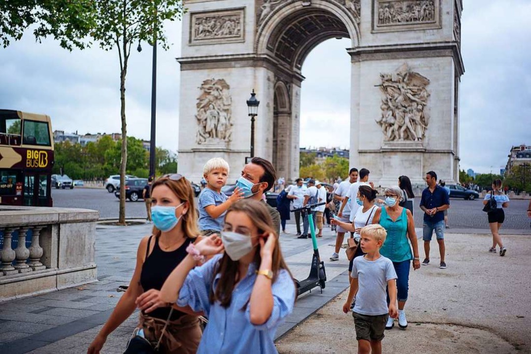 Maskenpflicht in der Pariser Innenstadt  | Foto: Kamil Zihnioglu (dpa)