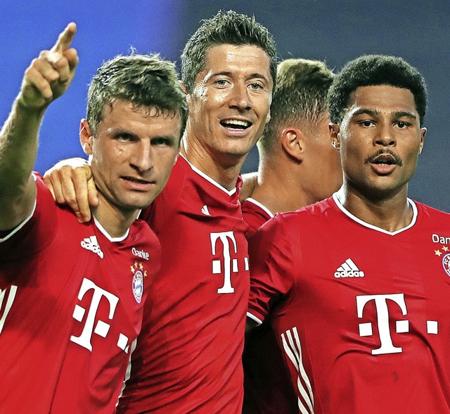 Drei Trmpfe der Bayern fr das Finale..., Robert Lewandowski und Serge Gnabry   | Foto: MIGUEL A. LOPES (AFP)