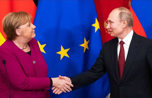 Bundeskanzlerin Angela Merkel (CDU) un...Russland, bei einem Treffen im Januar.  | Foto: Pavel Golovkin (dpa)