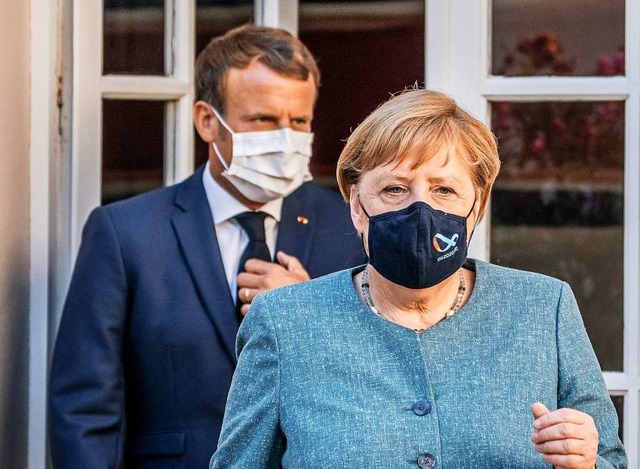 Bundeskanzlerin Angela Merkel und der franzsische Prsident Emmanuel Macron  | Foto: Michael Kappeler (dpa)