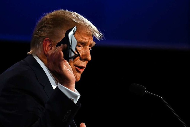 Selten mit Maske: US-Prsident Donald Trump.  | Foto: JIM WATSON (AFP)