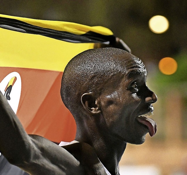 Verbesserte 2020 die Weltrekorde ber ...000 Meter: Joshua Cheptegei aus Uganda  | Foto: JOSE JORDAN (AFP)