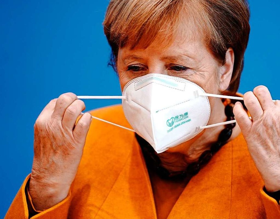 Bundeskanzlerin Angela Merkel (CDU) gi...tadtjournalisten eine Pressekonferenz.  | Foto: Kay Nietfeld (dpa)