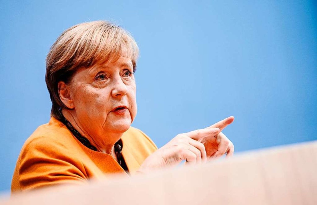 Kanzlerin Merkel begründet den Teil-Lo... Virus bestraft Halbherzigkeit&#8220;.  | Foto: KAY NIETFELD (AFP)