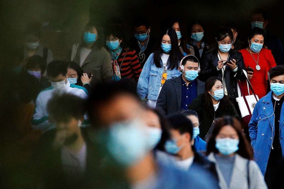 Die Pandemie scheint in China unter Ko...h das Land schottet sich zunehmend ab.  | Foto: Andy Wong (dpa)