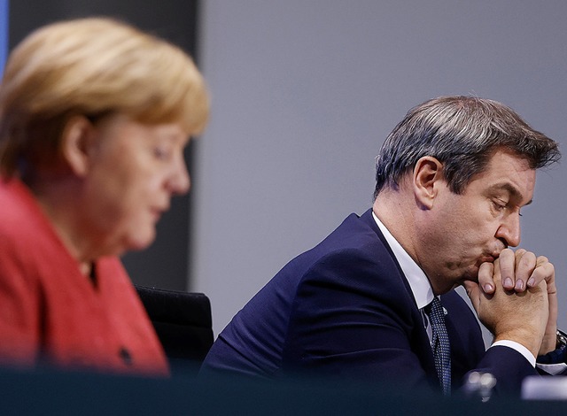 Angela Merkel und Markus Sder  | Foto: Odd Andersen (dpa)