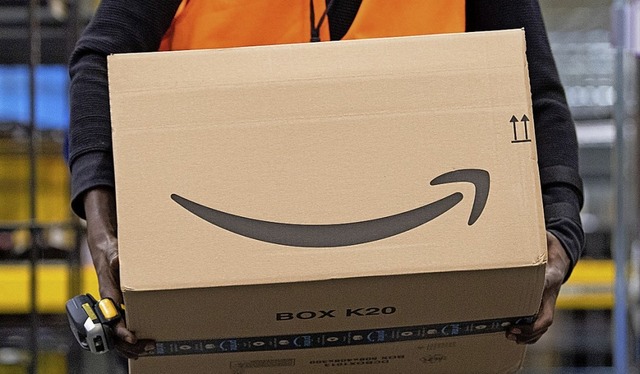 Mehr als 300 Millionen aktive Kunden hat Amazon.  | Foto: Sebastian Kahnert (dpa)