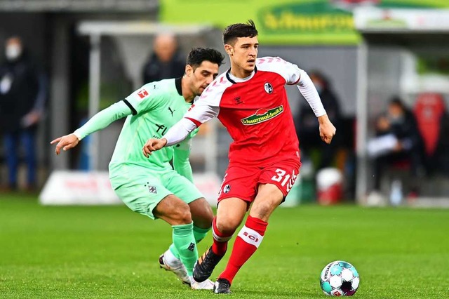 Keven Schlotterbeck, hier gegen Lars S...eim 2:2 gegen Borussia Mnchengladbach  | Foto: SC Freiburg/Achim Keller