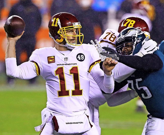 Gleich passt er: Washingtons Spielmacher Alex Smith  | Foto: Mitchell Leff (AFP)