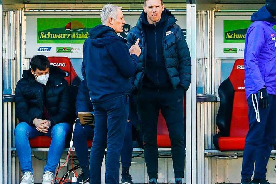 Pläuschchen unter Kollegen, die sich schätzen: Christian Streich und Julian Nagelsmann. (Foto: RALPH ORLOWSKI (AFP)) Pläuschchen unter Kollegen, die sich schätzen: Christian Streich und Julian Nagelsmann. (Foto: RALPH ORLOWSKI (AFP))