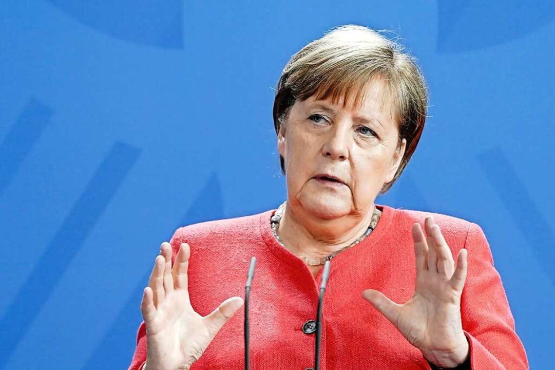 Bundeskanzlerin Angela Merkel (CDU) tr...r Frauen und Mnner ein (Archivbild).  | Foto: Jrg Carstensen (dpa)