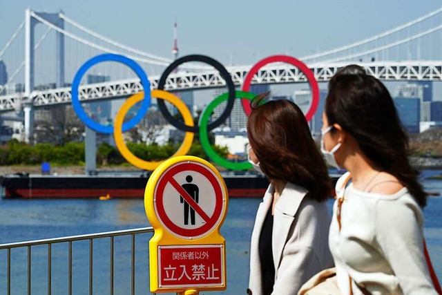 Auslndische Touristen werden bei den ...mmerspielen in Tokio nicht dabei sein.  | Foto: Eugene Hoshiko (dpa)