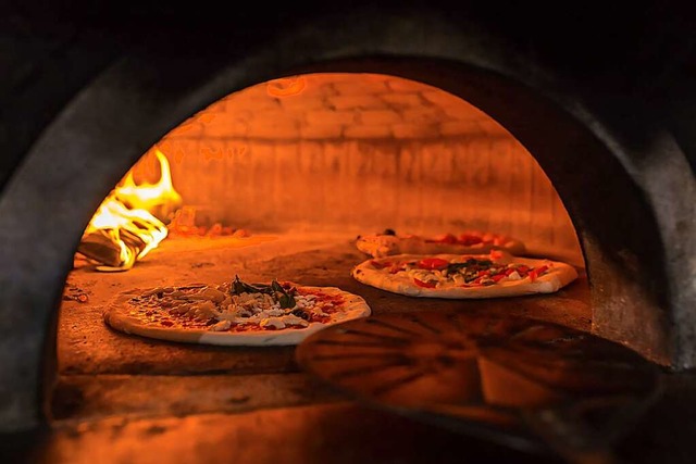 Pizza gehrt heute wie selbstverstndlich auf den Speisezettel der Deutschen.  | Foto: Mazur Travel  (stock.adobe.com)