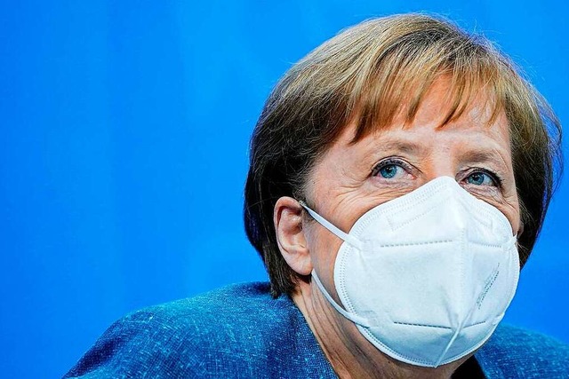 Angela Merkel: &#8222;Das heit nicht,...eder sofort geimpft werden kann&#8220;  | Foto: MICHAEL KAPPELER (AFP)
