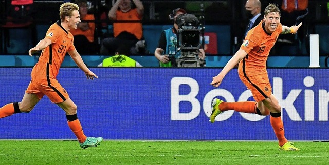 Ausgelassener Jubel nach seinem Tor f...t (rechts) &#8211; und Frenkie de Jong  | Foto: PIROSCHKA VAN DE WOUW (AFP)