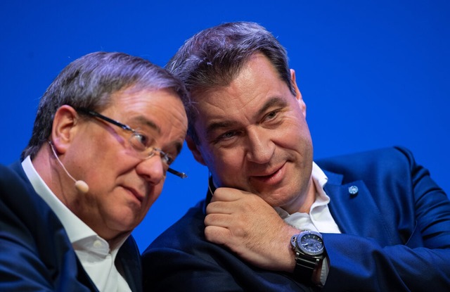 Die Parteivorsitzenden Armin Laschet (...Machtkampfes um die Kanzlerkandidatur.  | Foto: Guido Kirchner (dpa)