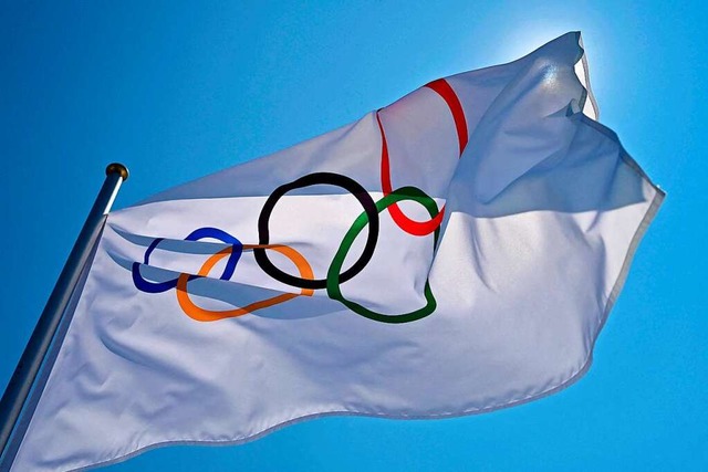 Die Olympische Flagge.  | Foto: ANDREJ ISAKOVIC (AFP)