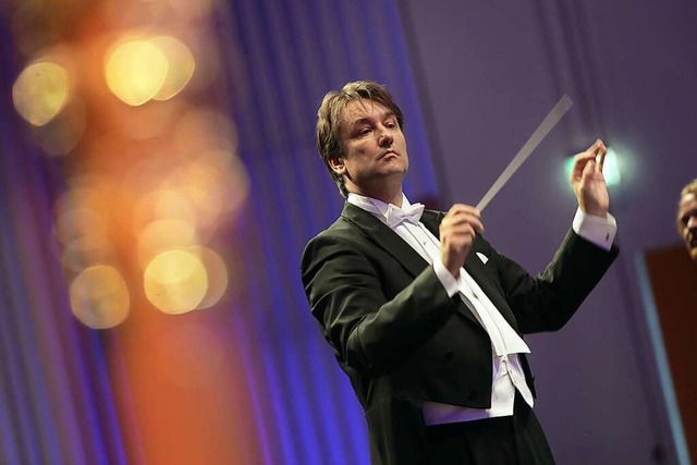 Dirigent Michael Gttler  | Foto: Christoph Breithaupt