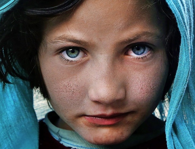 Ein Schicksal unter vielen: Ein afghan...iehen musste, in einem Lager in Kabul.  | Foto: Hedayatullah Amid