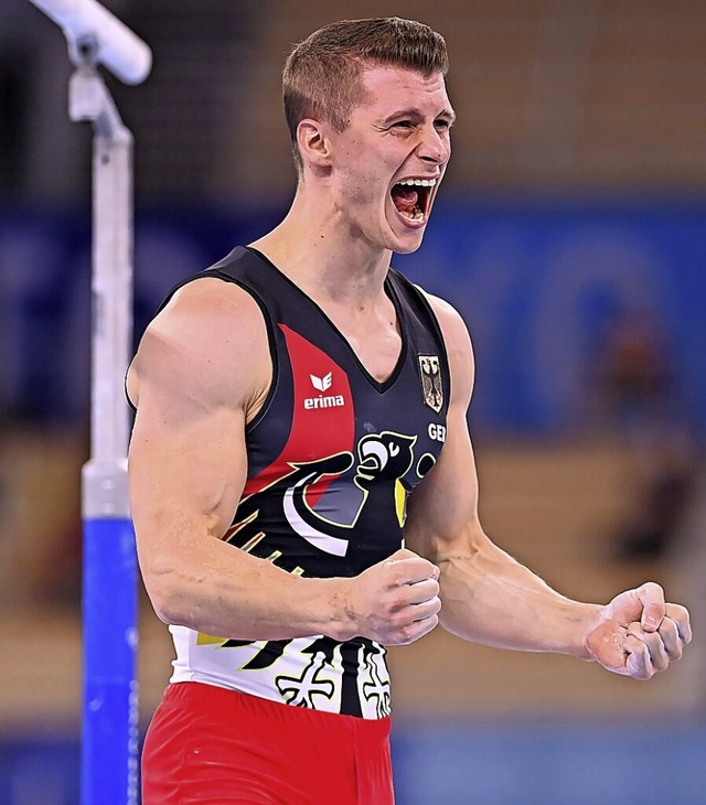 Lukas Dauser jubelt nach seiner bung.  | Foto: Marijan Murat (dpa)