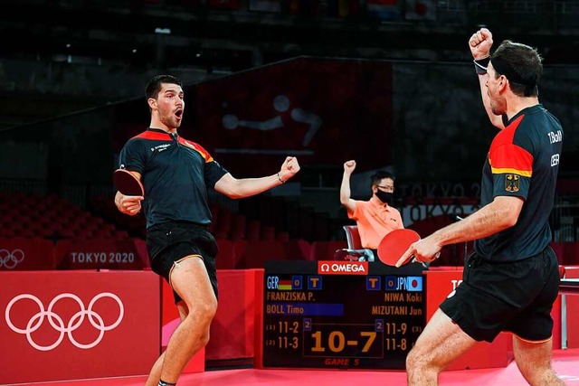 Holten den ersten Punkt fr das deutsc...atrick Franziska (links) und Timo Boll  | Foto: JUNG YEON-JE (AFP)