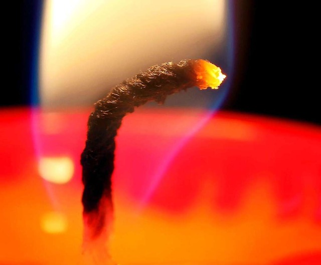 Brennender Kerzendocht.  | Foto: Martin Gerten
