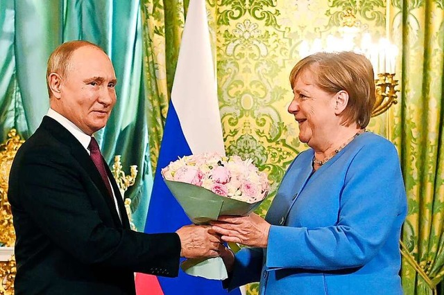 Kremlchef Wladimir Putin schenkte Ange...noch einmal bei Russlands Prsidenten.  | Foto: Uncredited (dpa)