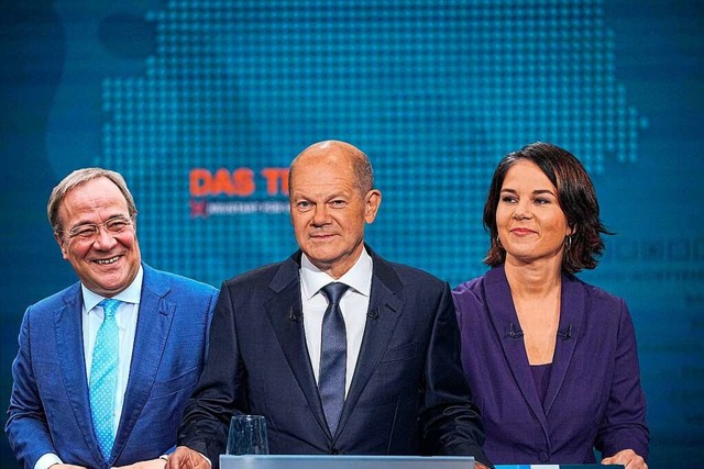 Wer kann Kanzler? Armin Laschet (CDU),...hre Parteien als Spitzenkandidaten an.  | Foto: MICHAEL KAPPELER ( afp)