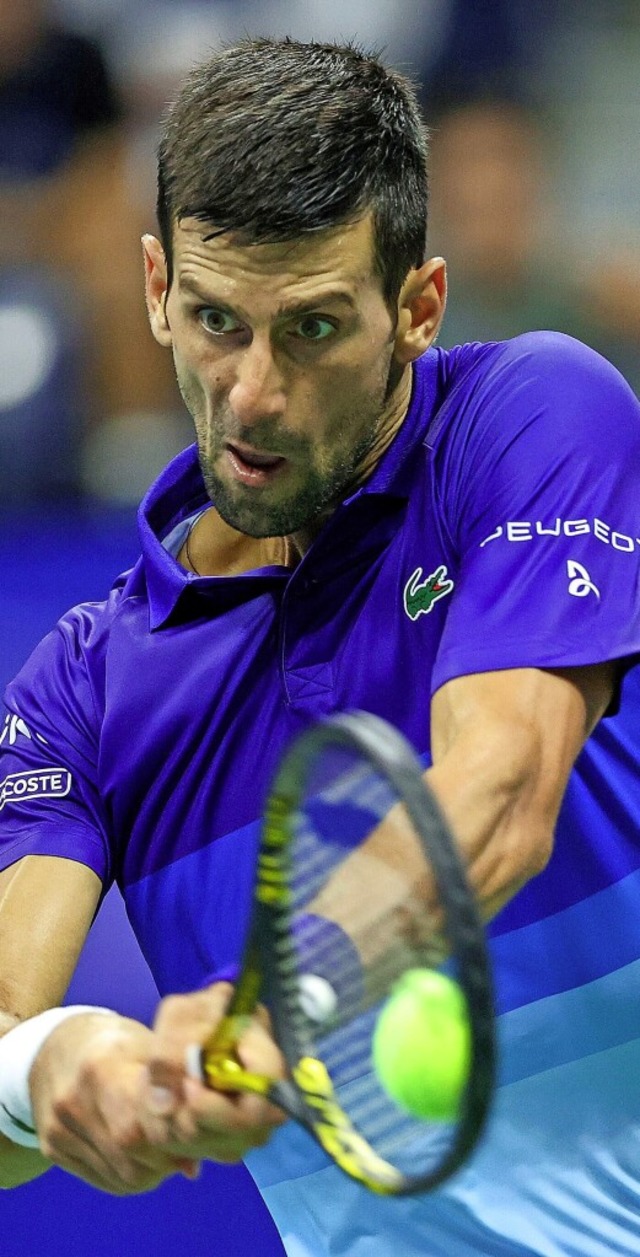 Voll konzentriert zum Grand Slam? Der Serbe Novak Djokovic  | Foto: ELSA (AFP)