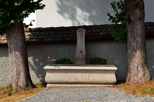 Brunnen an der alten Dorfkirche in Menzenschwand  | Foto: Christiane Sahli