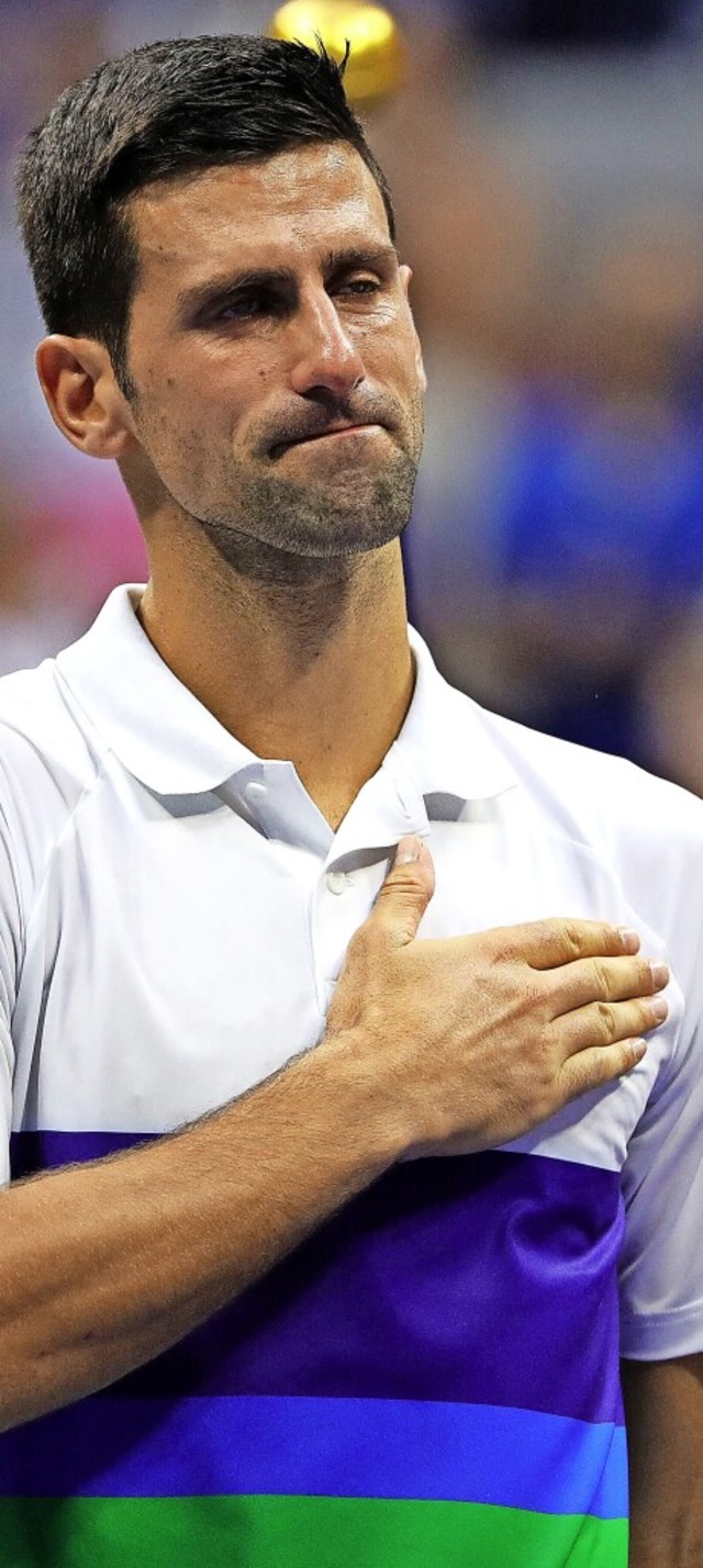 Von Herzen gerhrt: Novak Djokovic  | Foto: KENA BETANCUR (AFP)