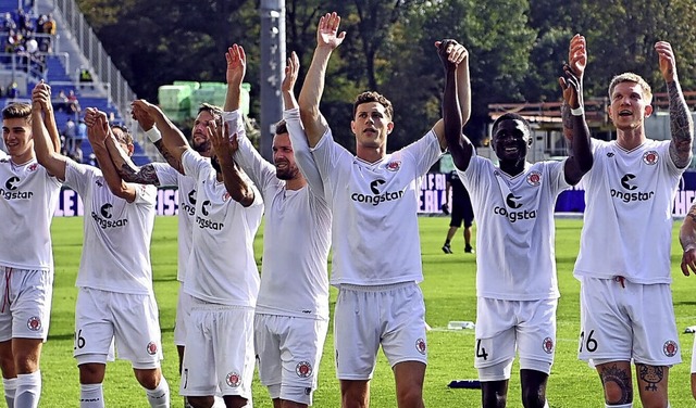 Ein erfolgreiches Team: der FC St. Pauli   | Foto: Uli Deck (dpa)