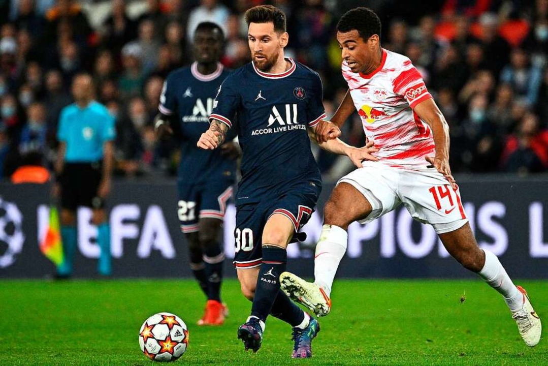 Lionel Messi gegen Tyler Adams (rechts)  | Foto: ANNE-CHRISTINE POUJOULAT (AFP)