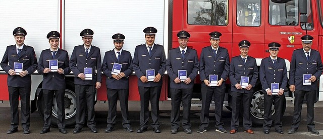 Zufriedene Kameraden der Feuerwehr  G...tkommandant Thomas Mutter (von links).  | Foto: Hans-Jrgen Sackmann