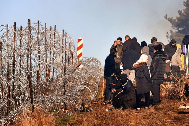 Belarus&#8217; Machthaber Lukaschenko ... die Flchtlinge gerade das Gegenteil.  | Foto: Leonid Shcheglov (dpa)