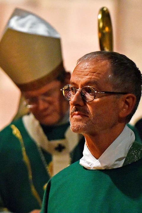 Peter Neher beim Festgottesdienst (im Hintergrund Erzbischof Stephan Burger)  | Foto: Michael Bamberger