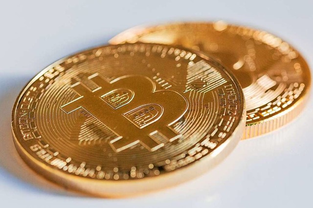 Kryptowhrungen wie Bitcoin sind ein d...r Sammler und Sammlerinnen einen Wert.  | Foto: Fernando Gutierrez-Juarez (dpa)