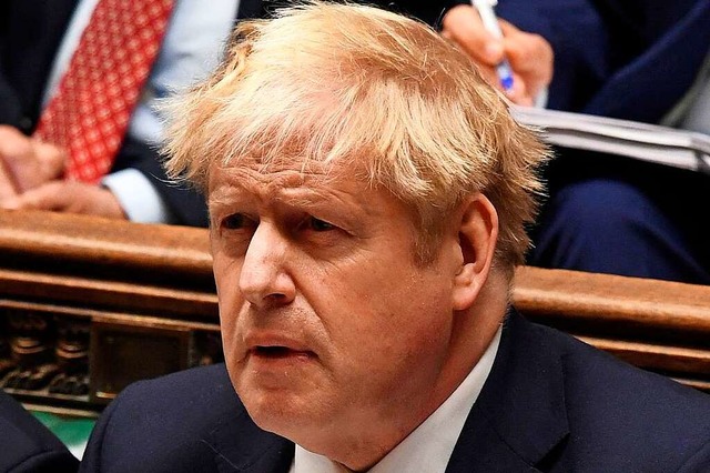 Der britische Premierminister Boris Jo...Corona-Regeln im Mai 2020 unter Druck.  | Foto: JESSICA TAYLOR (AFP)