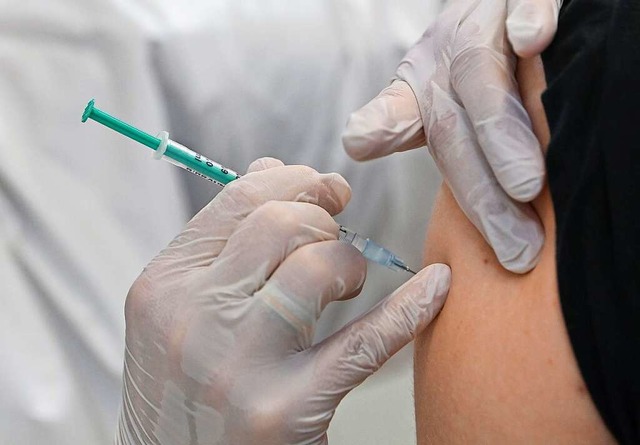 Impfen verspricht Erfolg auf dem Weg a...mpfpflicht wirklich Sinn? (Symbolbild)  | Foto: Patrick Pleul (dpa)