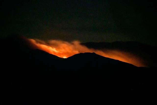 Feuer im Aberdare-Nationalpark in Kenia.  | Foto: YASUYOSHI CHIBA (AFP)