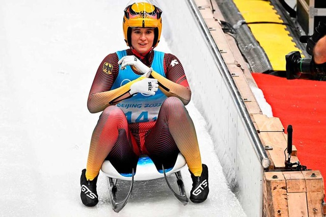 Natalie Geisenberger ist mit ihrer sec...ielen deutsche Rekord-Olympiasiegerin.  | Foto: JOE KLAMAR (AFP)
